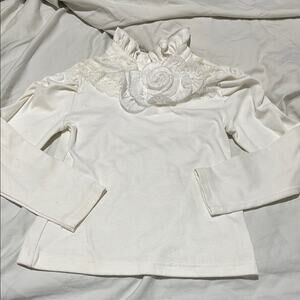 BMB couture Elegant White Long Sleeve Top with Floral Detail size 4 euc